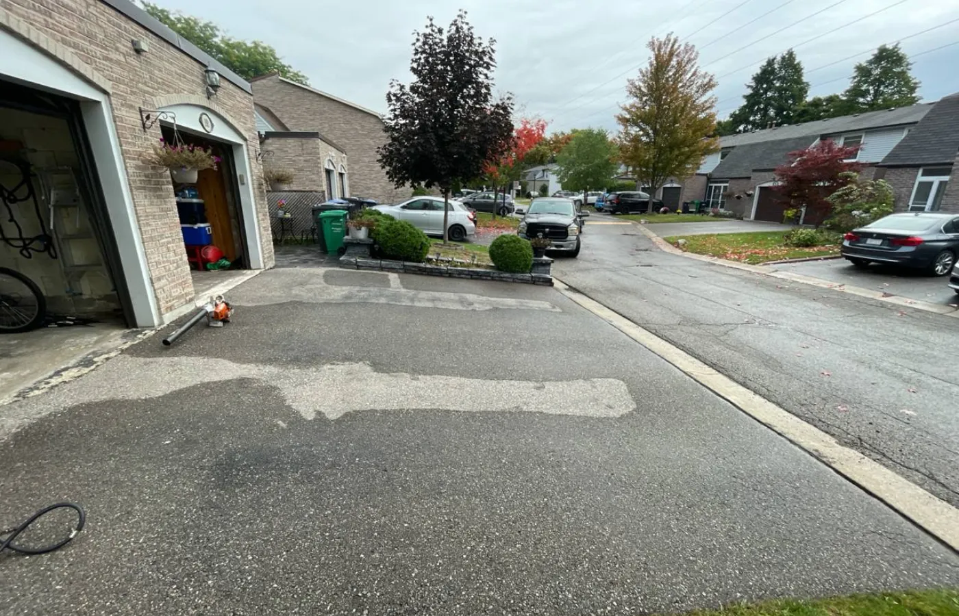 White's Pressure Washing | Why Driveways Turn Dark During Rainy Seasons